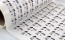 1000 Uncoated paper Diecut Sticker on a roll - DL